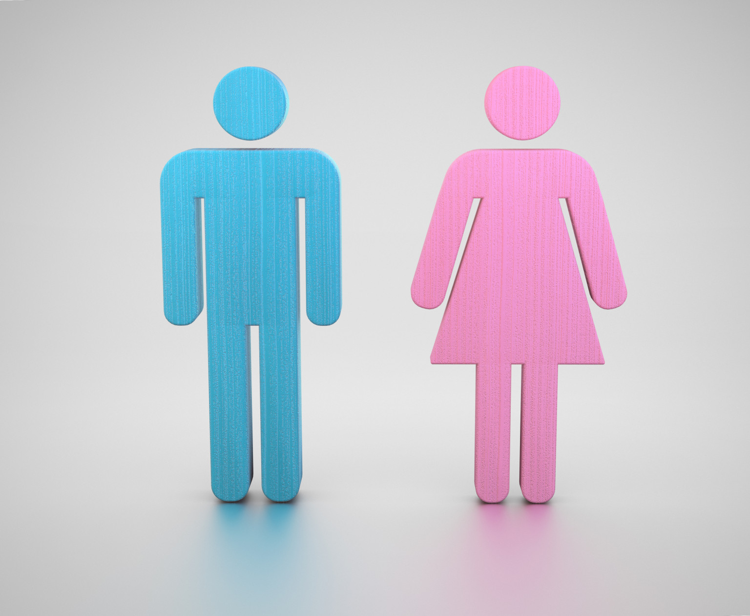 Blue and pink restroom symbols.